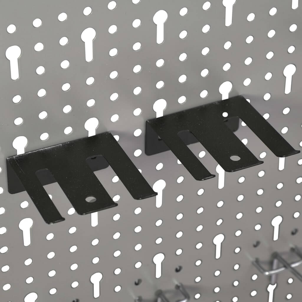 Black metal hooks mounted on a perforated steel pegboard for organizing tools in workshops or garages.