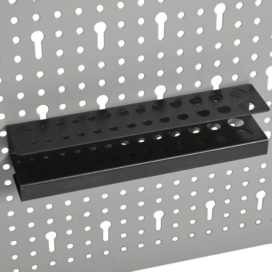 Wall-mounted pegboard with a black tool shelf, designed for organizing tools in workshops and garages.