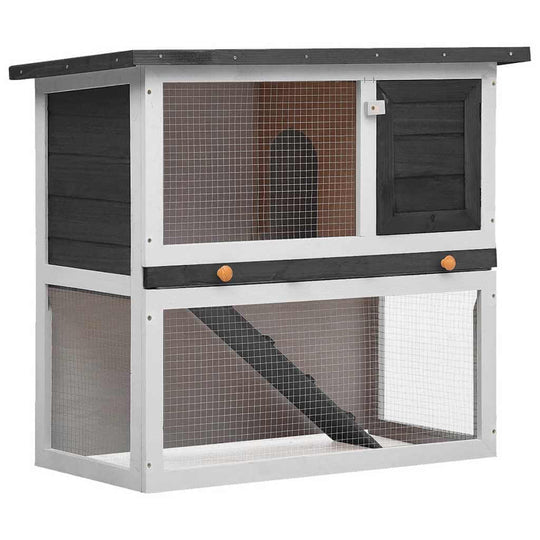 Outdoor Rabbit Hutch  Door  Wood with multi-level design and safety wire mesh for small pets.
