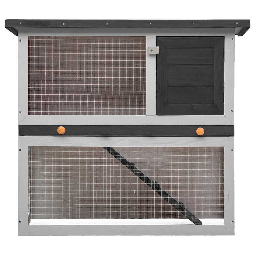 Outdoor Rabbit Hutch  Door  Wood with multiple sections for play, exercise, and safety for small animals.
