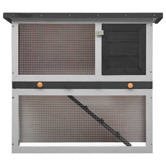 Outdoor Rabbit Hutch  Door  Wood with multiple sections for play, exercise, and safety for small animals.