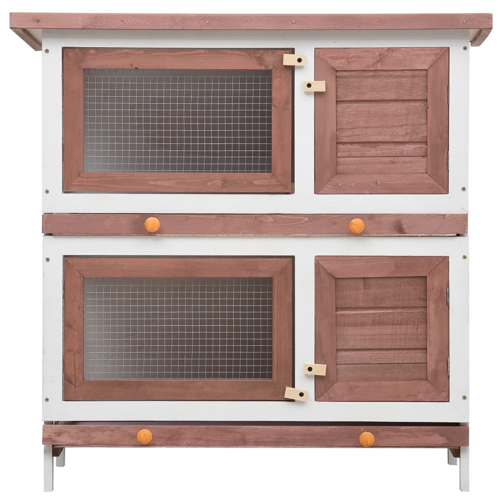 Outdoor rabbit hutch with four doors, two-layered design in brown wood and white finish, perfect for small animals' safety and play.