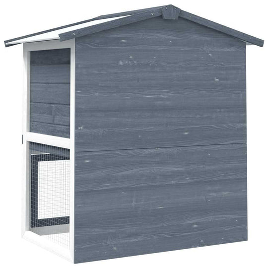 Outdoor rabbit hutch in grey wood with three doors, perfect for providing a cozy space for small animals like rabbits.