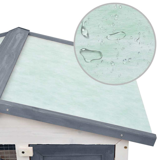 Outdoor rabbit hutch roof showing water-resistant design, ideal for protecting pets from rain and moisture.