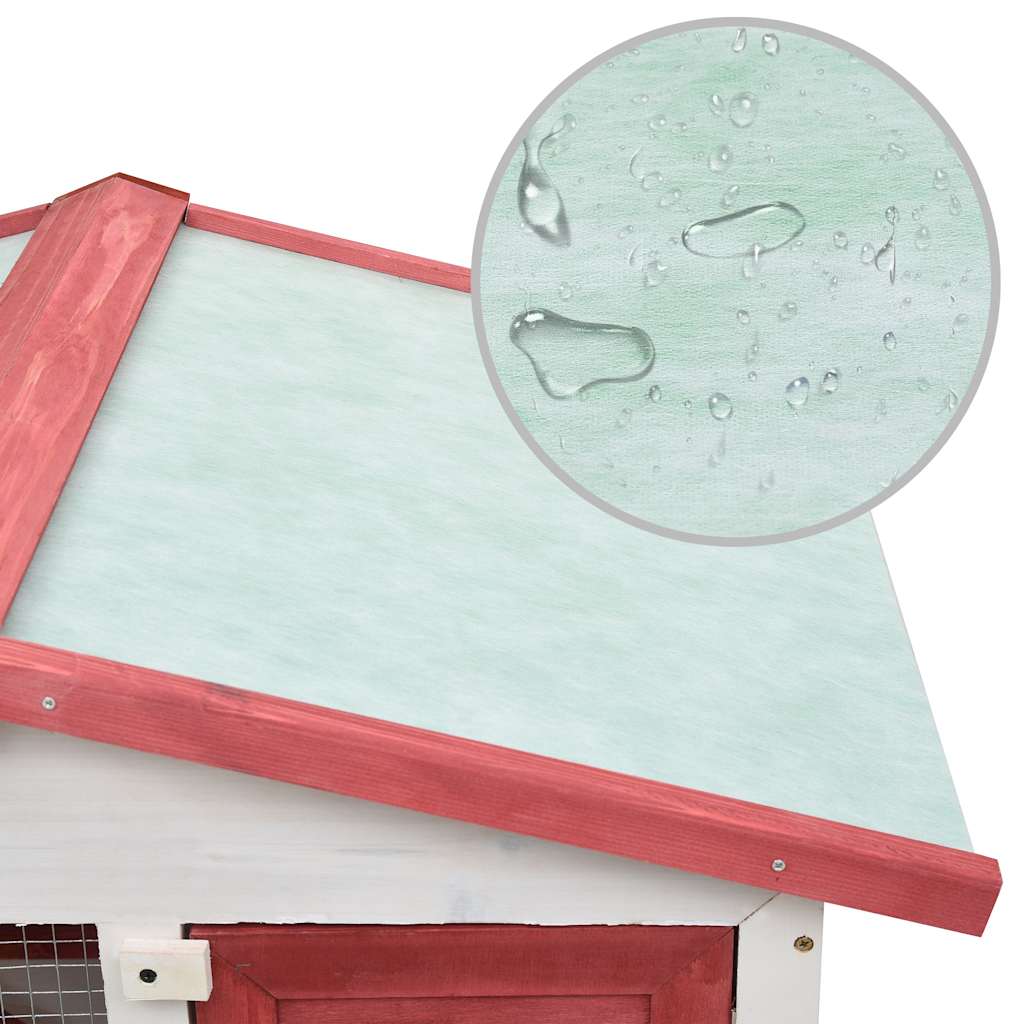 Close-up of the waterproof roof on the Outdoor Rabbit Hutch 3 Doors Wood, featuring droplets of water.
