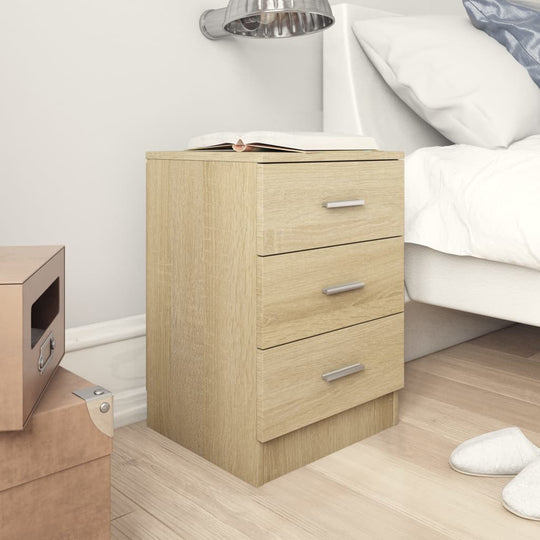 Bedside cabinet in Sonoma oak finish with three drawers, perfect for bedroom storage and organization.