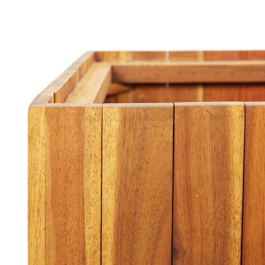 Close-up of a wooden garden raised bed made from solid acacia wood, showcasing its natural grain and weather-resistant finish.