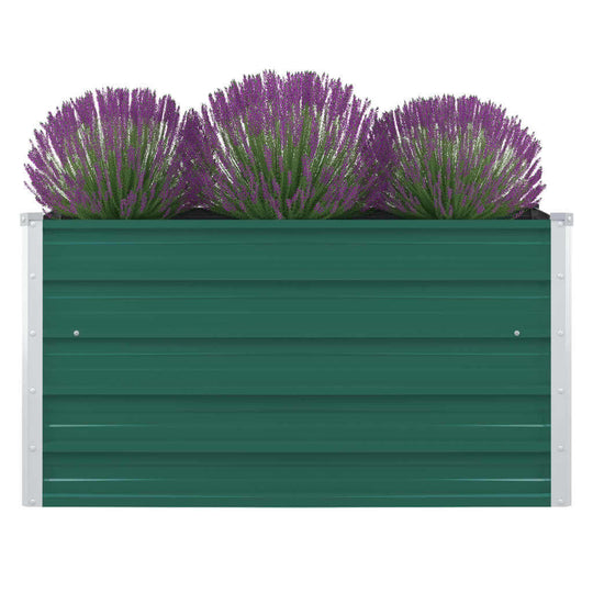 Raised garden bed made of green galvanised steel, filled with vibrant lavender plants for a beautiful outdoor display.