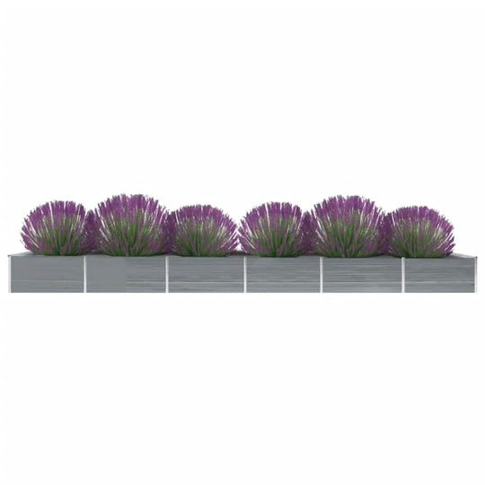 Galvanised steel garden raised bed with vibrant purple flowers, perfect for outdoor gardening and plant display.