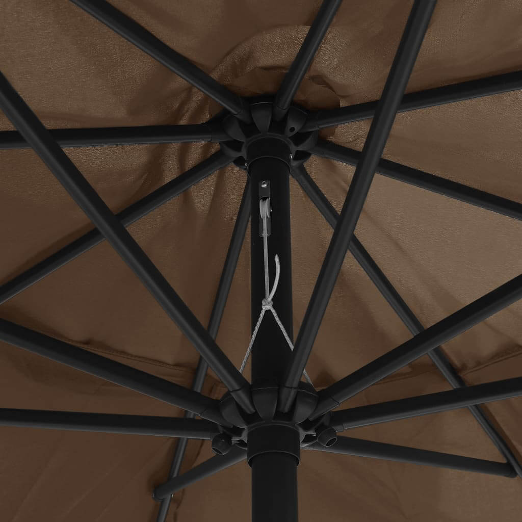 Interior view of a taupe outdoor parasol showing metal pole and sturdy ribs for stability and durability.