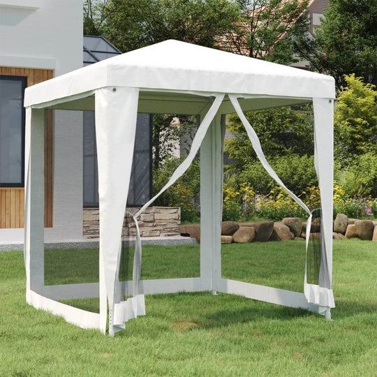 White party tent with 4 mesh sidewalls set up in a garden for outdoor events and gatherings.