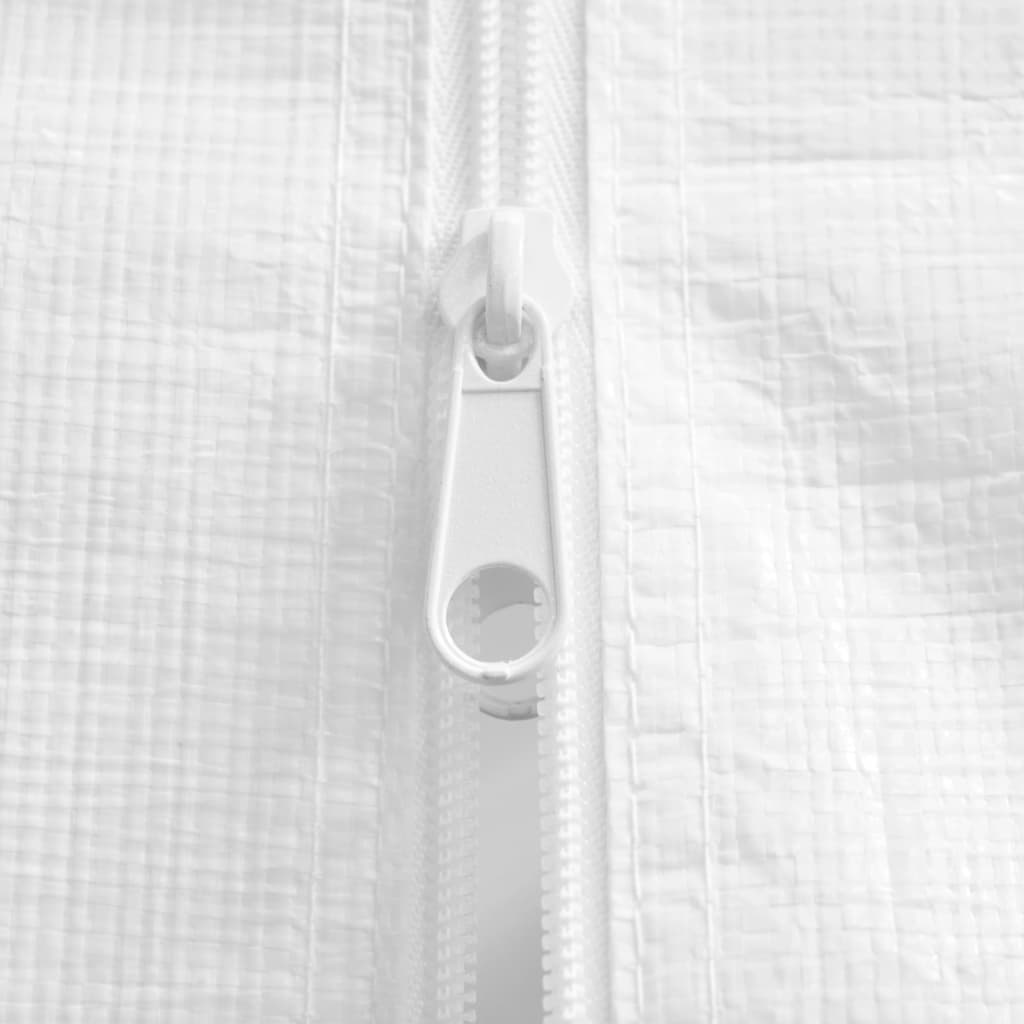 Close-up of zipper on white outdoor party tent for secure closure and easy access.