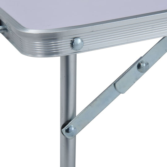 Folding Camping Table  Aluminium 60x40 cm close-up of sturdy metal frame and tabletop detail.