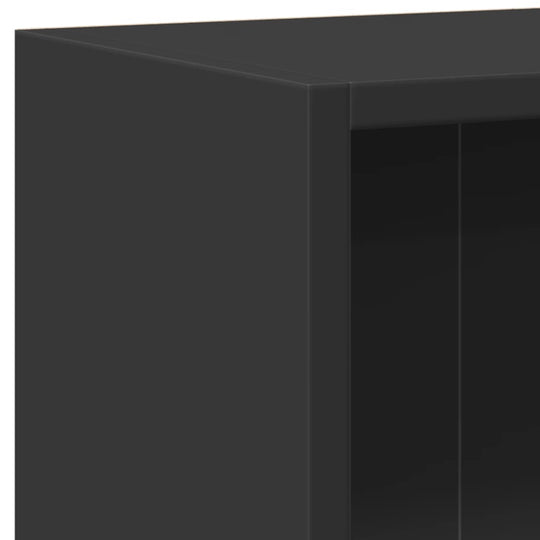 Close-up of a black bookshelf made from engineered wood, showcasing its sleek design and sturdy construction.