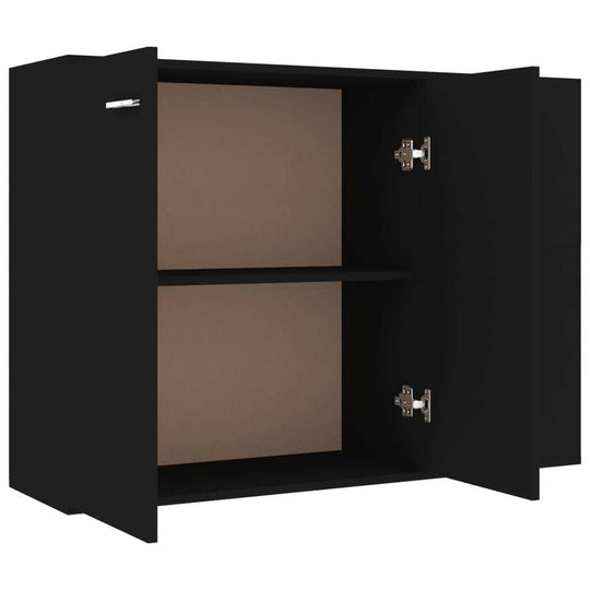 Black sideboard with open doors showcasing spacious interior and adjustable shelf for decorative storage.