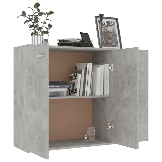 Concrete grey sideboard with open shelves, books, and decorative items, ideal for minimalist home furniture.