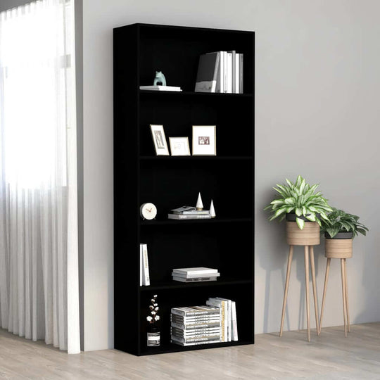 Modern 5-tier black book cabinet in a minimalist living room with plants and decor items. Ideal for stylish storage solutions.