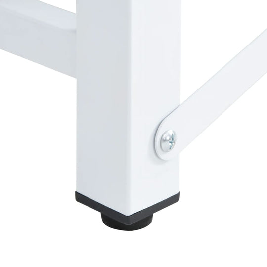 Close-up of sturdy white steel pedestal leg with non-slip pad for washing and drying machines, enhancing stability and height.