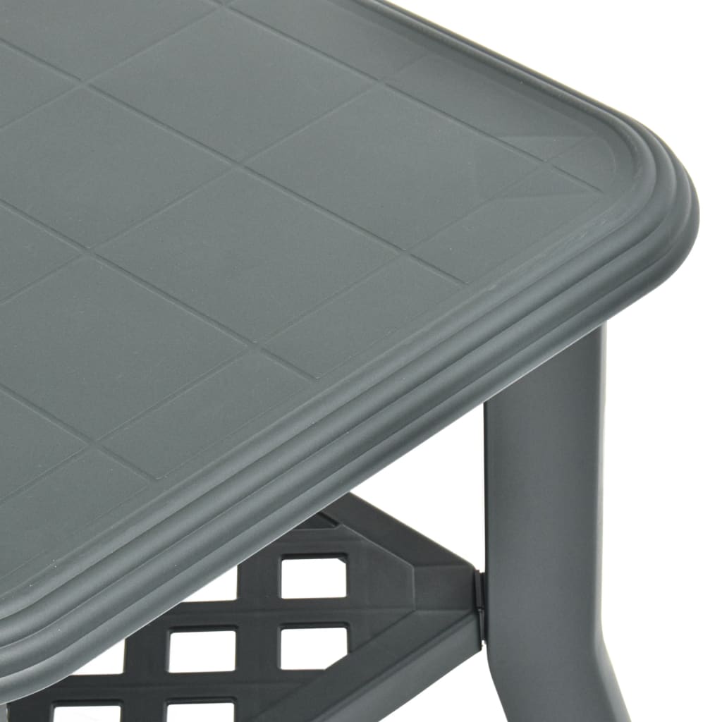 Close-up of a sleek green plastic coffee table with a square top and decorative storage shelf, perfect for outdoor use.