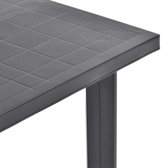 Close-up of the anthracite outdoor garden table with a textured surface and sturdy legs, perfect for al fresco dining.