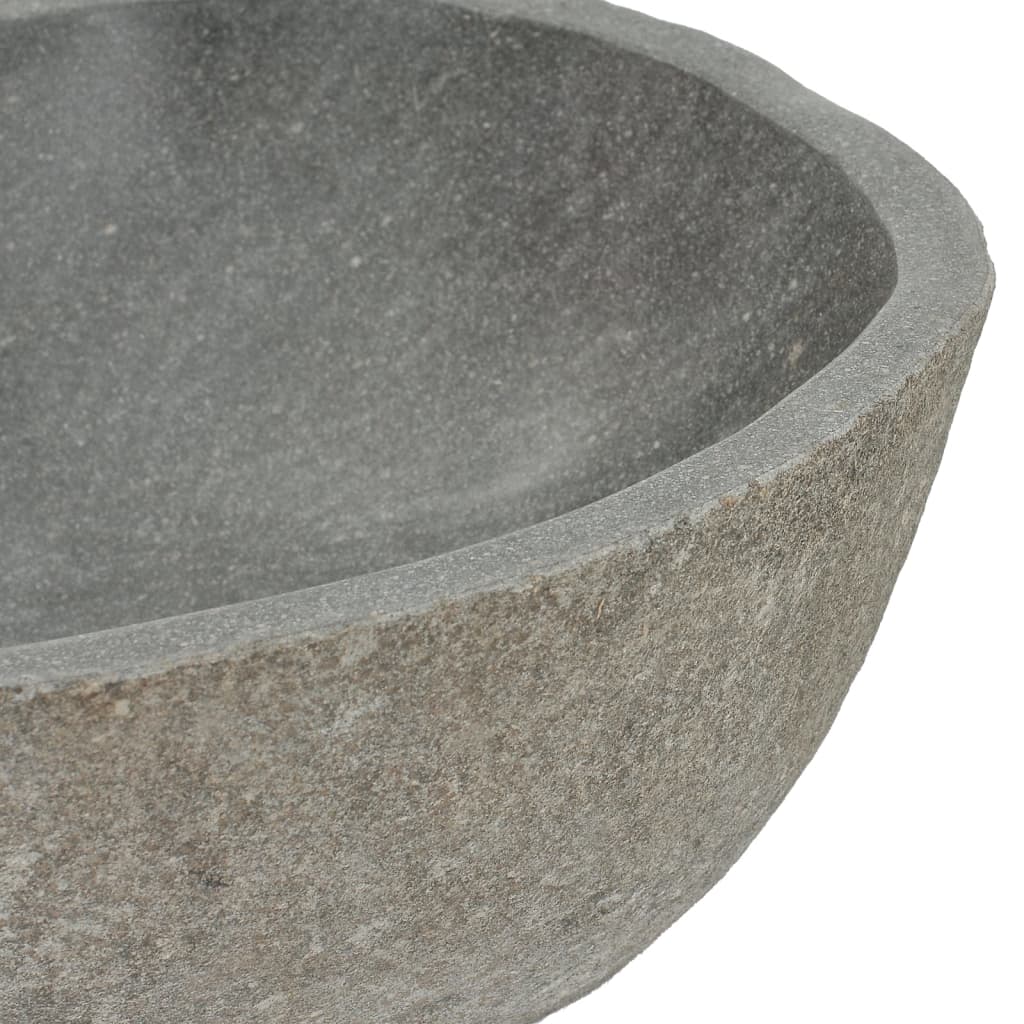 Oval river stone basin with smooth inner surface, perfect for stylish bathroom decor and easy cleaning.