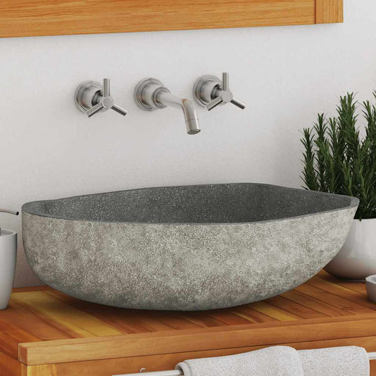 Basin River Stone Oval basin made of natural river stone, stylish addition to any bathroom, features smooth interior for easy cleaning.