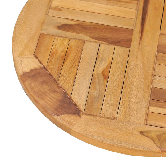 Close-up of a solid teak wood rotating table disk with a smooth finish, highlighting its natural grain and craftsmanship.