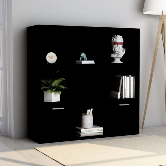 Sleek black book cabinet with open shelves, plants, and decorative items, perfect for modern furniture decor.