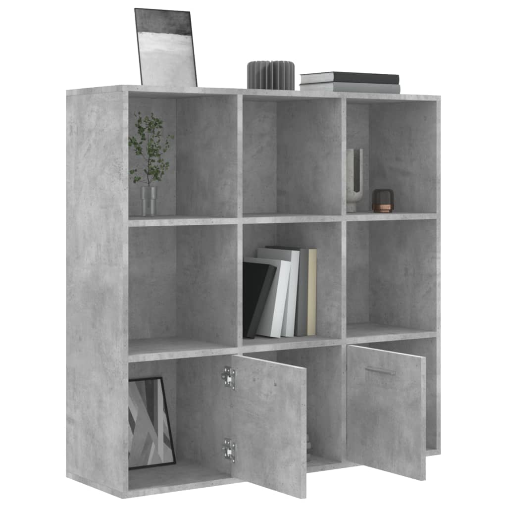 Book cabinet in concrete grey with 7 open cubes and 2 doors for stylish storage of books and decor items.