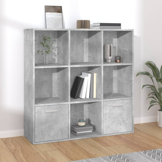 Concrete grey book cabinet with 7 open cubes and 2 doors, stylish furniture for storage and decor.