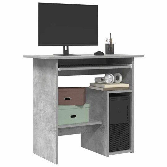 Modern concrete grey desk with monitor, storage shelves, and sturdy design, perfect for small spaces and home offices.