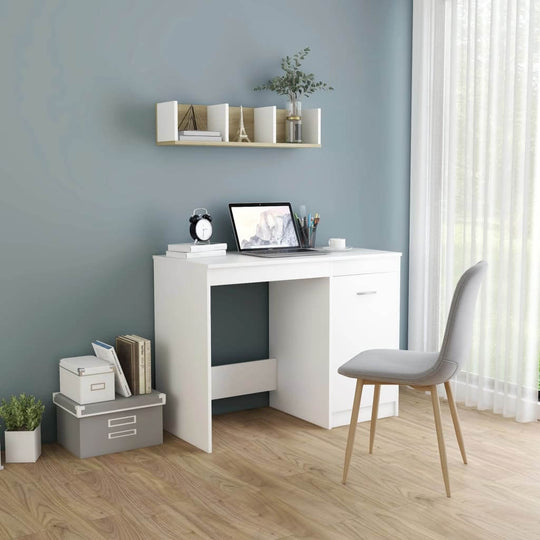 Modern white desk with storage, integrated cabinet, and stylish chair in a contemporary home office setting.