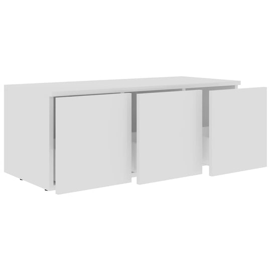 White engineered wood TV cabinet with three drawers, ideal for stylish storage in your living room.