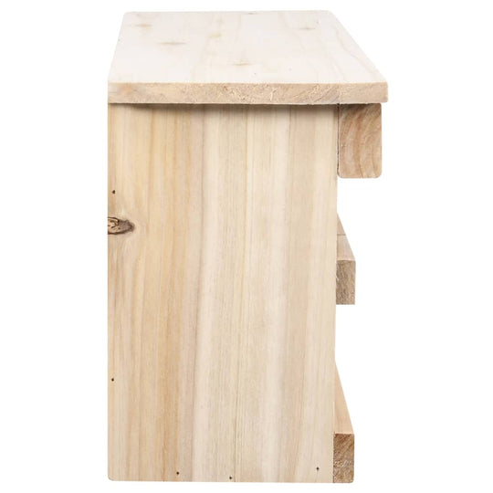 Side view of a natural firwood sparrow house, showcasing its sturdy construction and smooth finish.