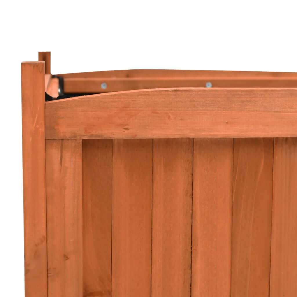 Close-up of a wooden raised bed made of durable firwood, ideal for outdoor gardening and plant display.