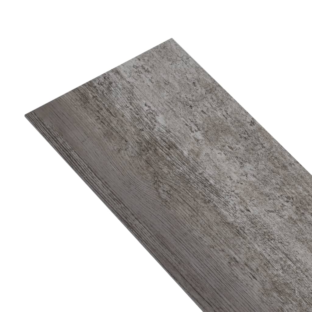 Self-adhesive PVC flooring plank in a gray striped wood design, ideal for indoor use and easy to install.