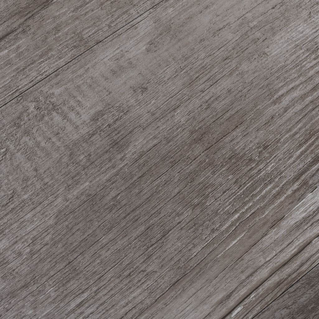 PVC flooring planks in a matt wood brown finish, showcasing a textured design suitable for stylish interior decor.