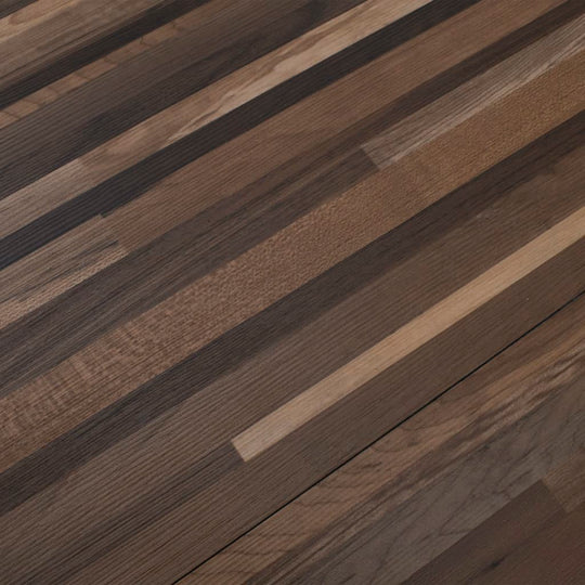 Self-adhesive PVC flooring planks in striped brown design, showcasing a modern and stylish surface for interior spaces.