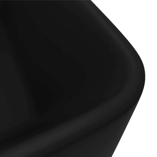 Close-up of luxurious matt black ceramic wash basin corner, stylish addition for modern bathrooms and washrooms.