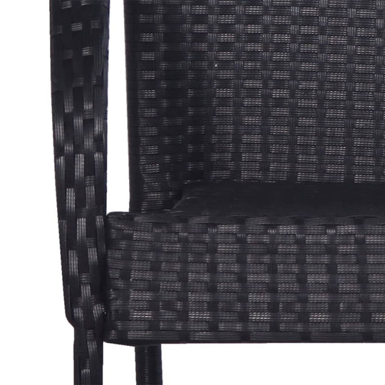 Close-up of stackable outdoor chair made of black poly rattan, showcasing its durable design and weave texture.