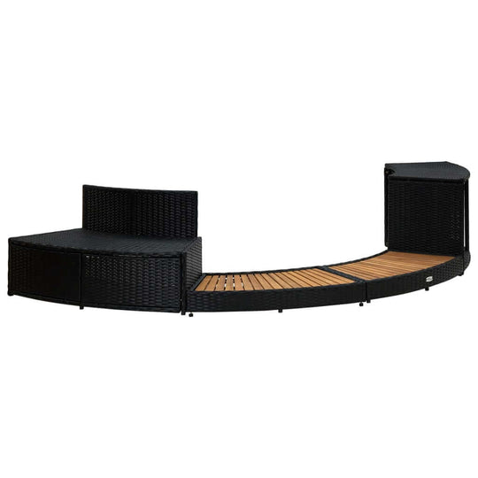 Stylish black poly rattan spa surround with acacia wood accents, featuring built-in storage for a modern hot tub area.