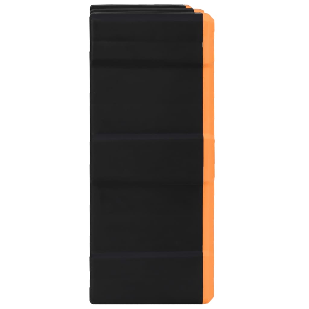 Foldable black and orange exercise mat, ideal for yoga and fitness workouts, offering comfort and support during exercises.