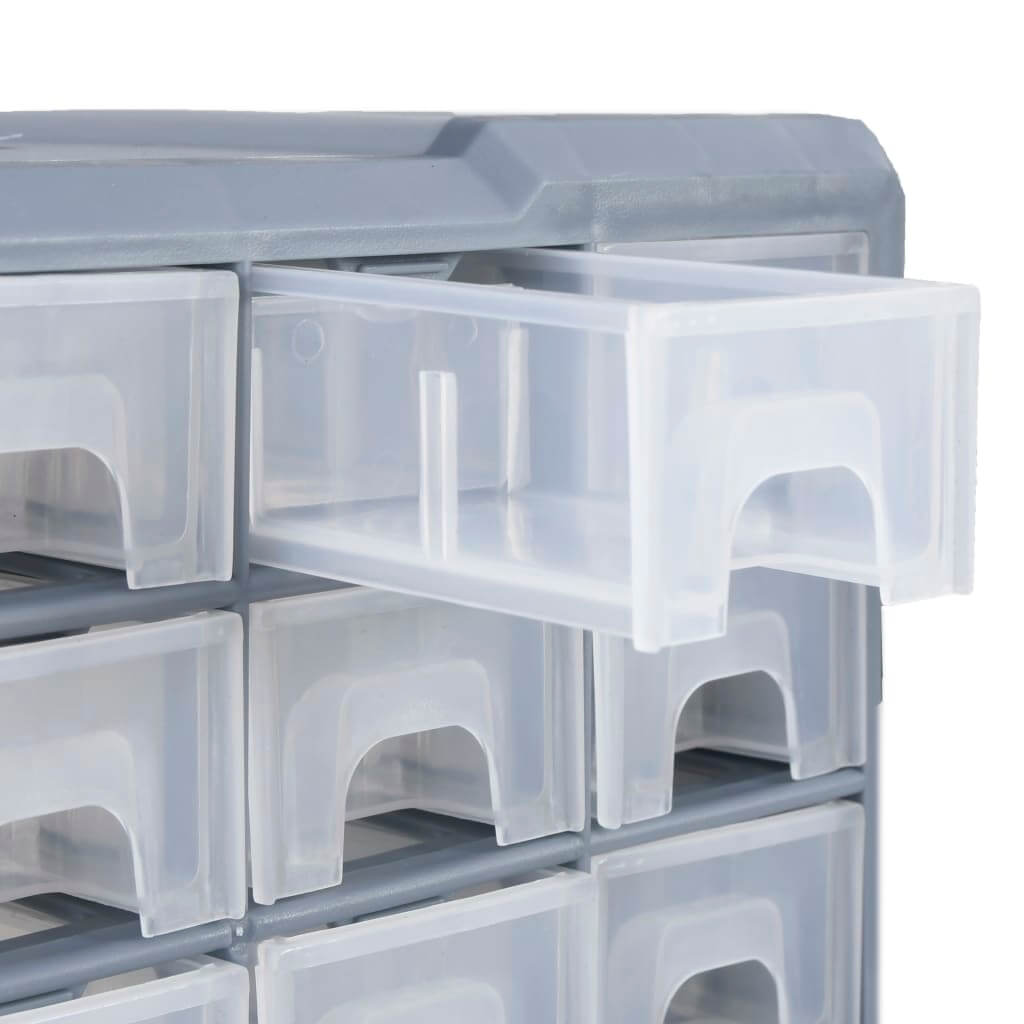 Close-up of a multi-drawer organiser with one clear drawer open, showcasing storage for tools and accessories.