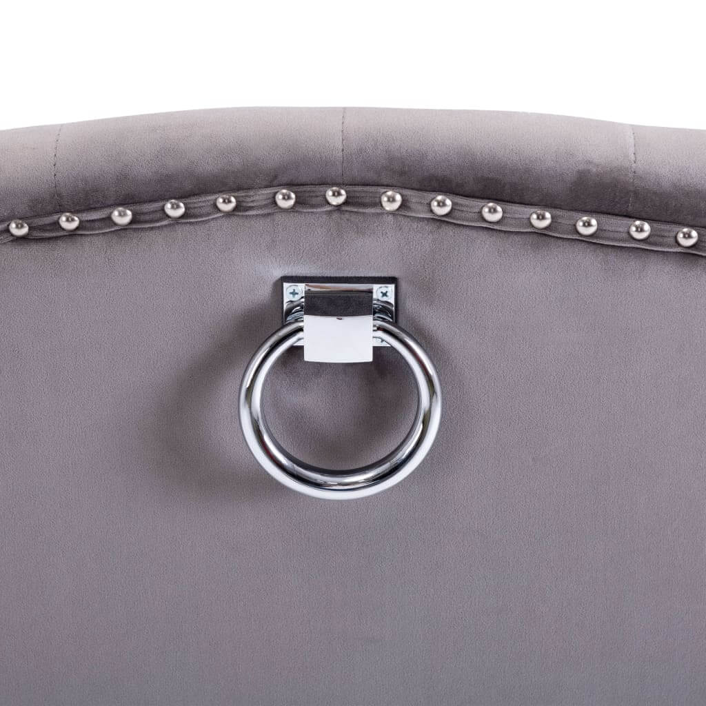 Close-up of the backrest of Dining Chairs  pcs  Velvet with decorative metal rivets and a stylish circular handle.