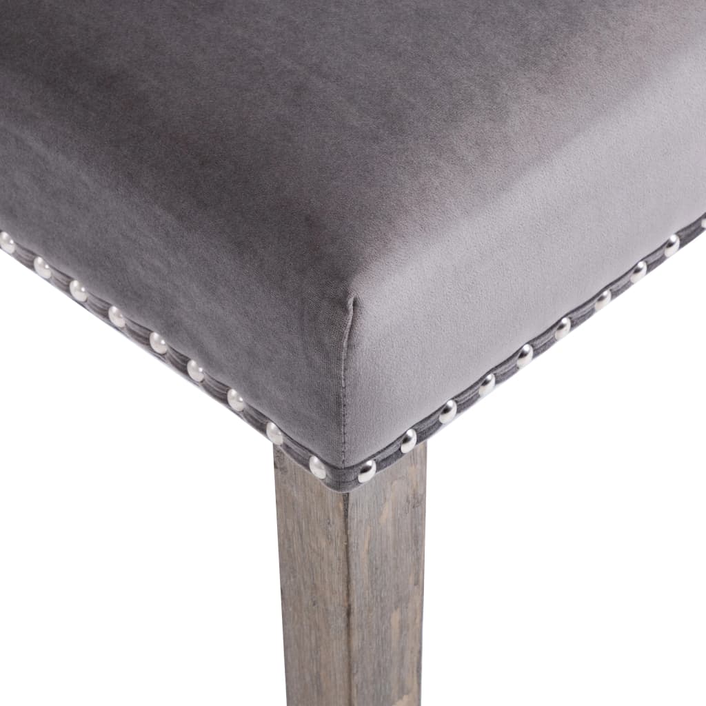 Dining Chairs  pcs  Velvet close-up of soft grey velvet upholstery with decorative metal rivets on the edge.