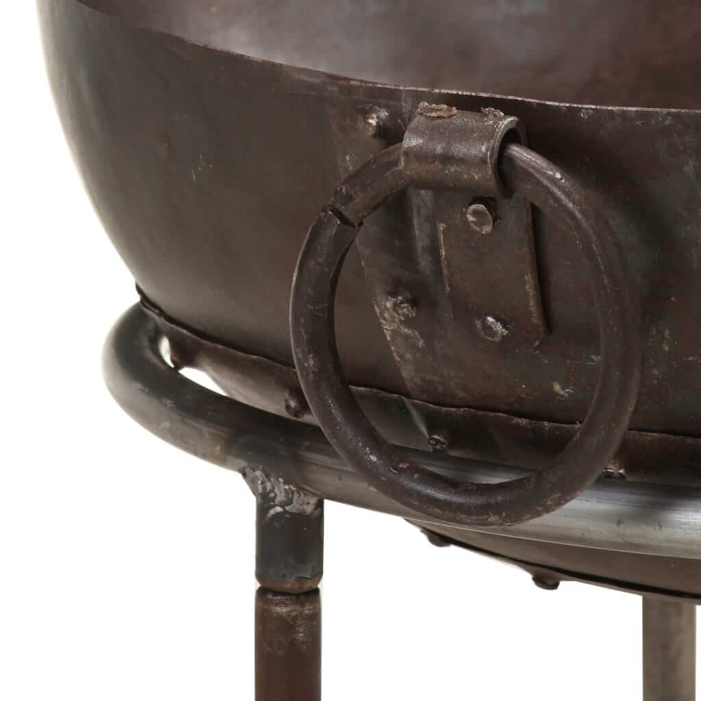 Close-up of Rustic Fire Pit – Durable Iron Outdoor Heater with rusted detailing and side ring handle.
