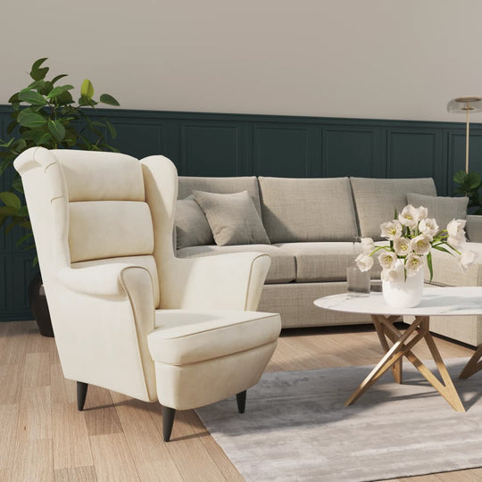 Cream white velvet armchair in modern living room, showcasing stylish and comfy home furniture design.