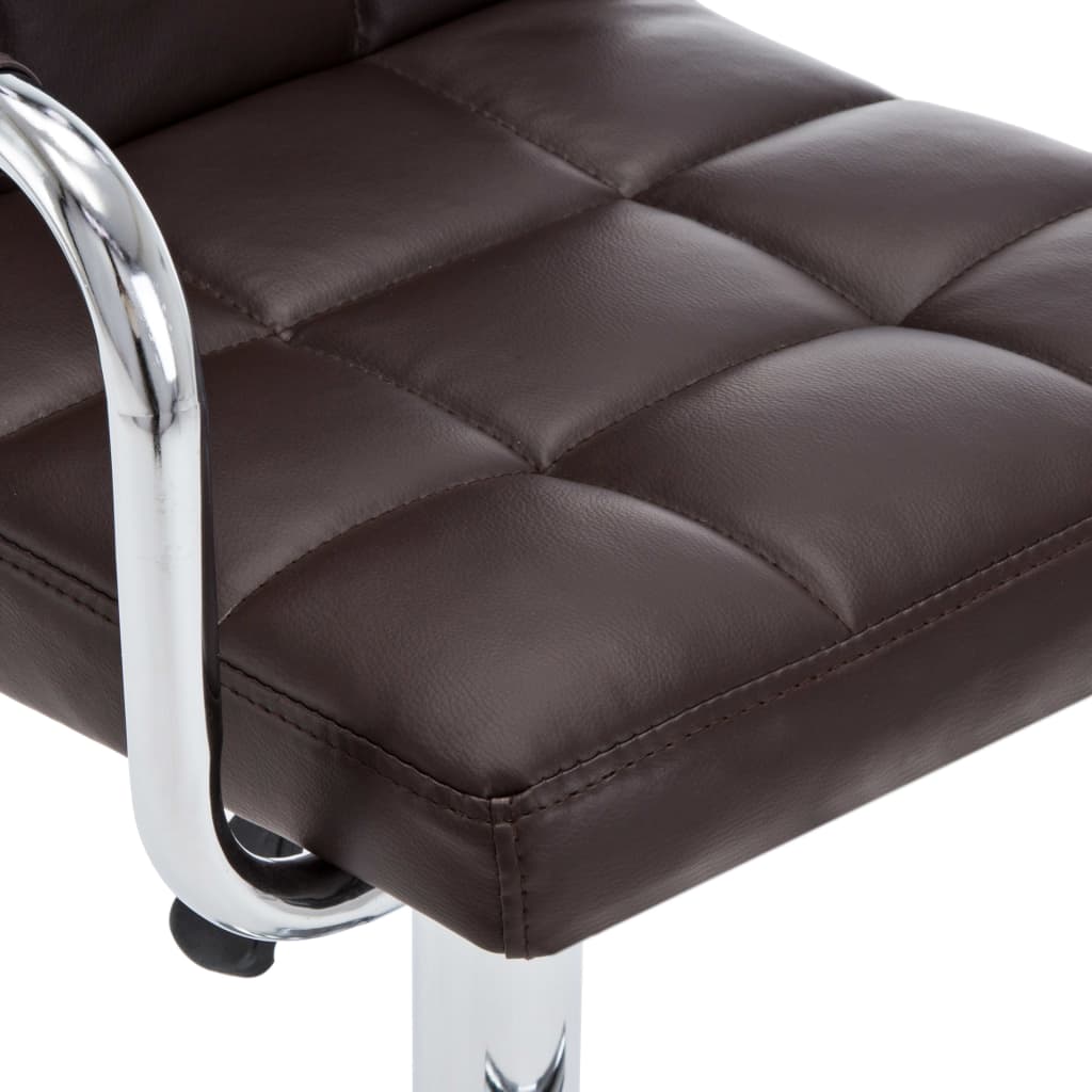 Close-up of brown faux leather bar stool seat with chromed steel frame, ideal for outdoor and indoor furniture settings.