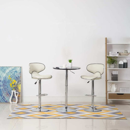 Stylish cream faux leather bar stools in a modern home setting, ideal for outdoor living spaces and patio furniture.