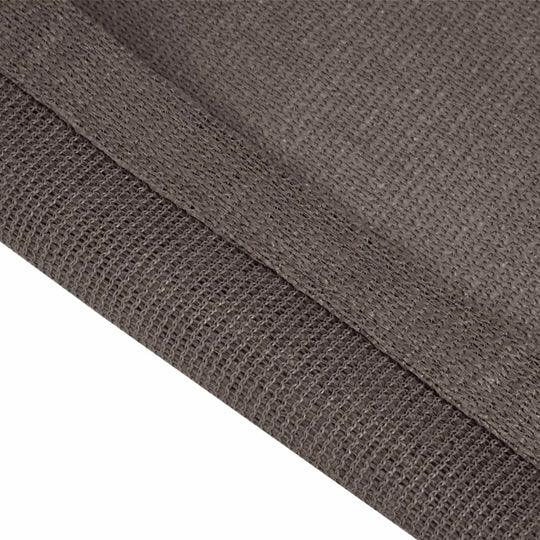 Close-up of the textured fabric edge of a tent carpet in anthracite color, showcasing its durable construction.